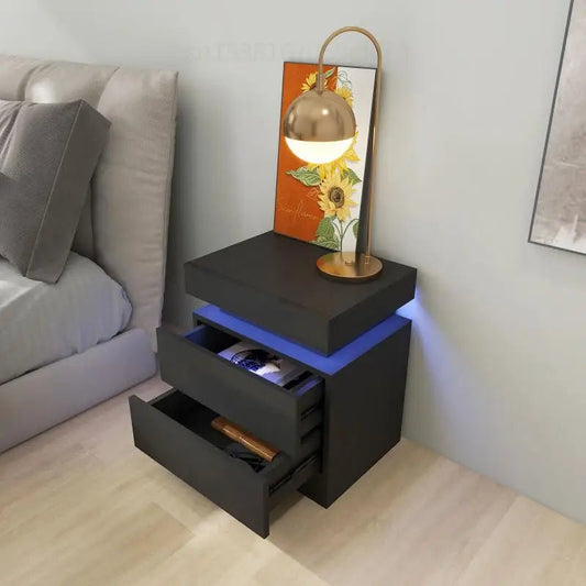 Table de chevet moderne TavovaT avec LED bleue intégrée, 2 tiroirs en noir mat, design flottant et lampe tournesol dorée, meuble chambre élégant