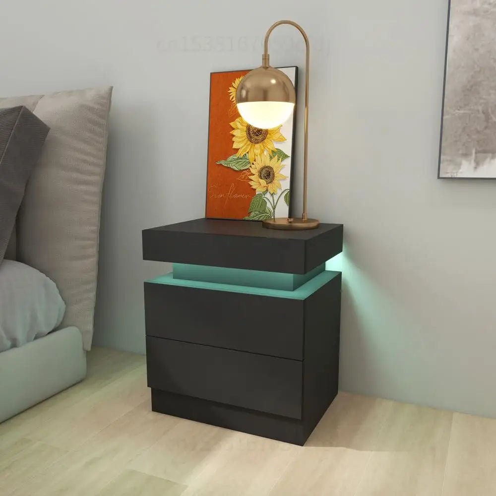 Table de chevet moderne TavovaT avec éclairage LED turquoise, 2 tiroirs noir mat, lampe dorée et décoration tournesol, design contemporain chambre